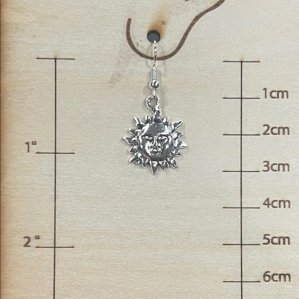 Silver Sun Face Dangle Earrings